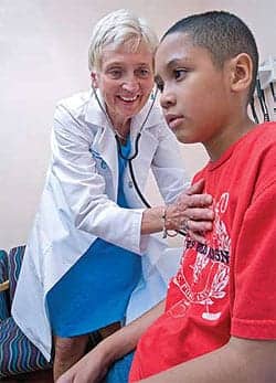 Judith A. Owens, with patient Eliazar Santus