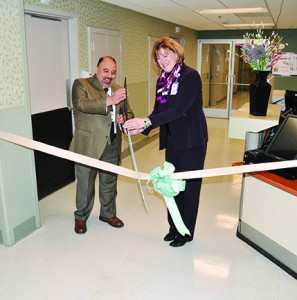 Sayed and Cynthia Breyfogle, director of the medical center, celebrate the center's opening in January.