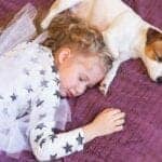 How Does Sharing a Bed with a Pet Impact Kids’ Sleep?